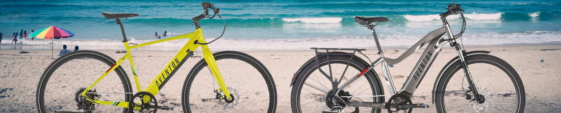 two aventon electric bikes on a beach