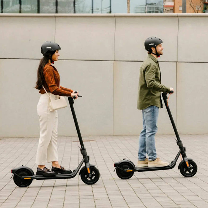 Segway Ninebot F2 Pro lifestyle couple riding