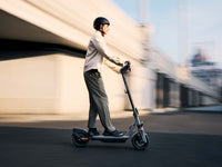 segway ninebot f3 electric scooter feature lifestyle guy riding