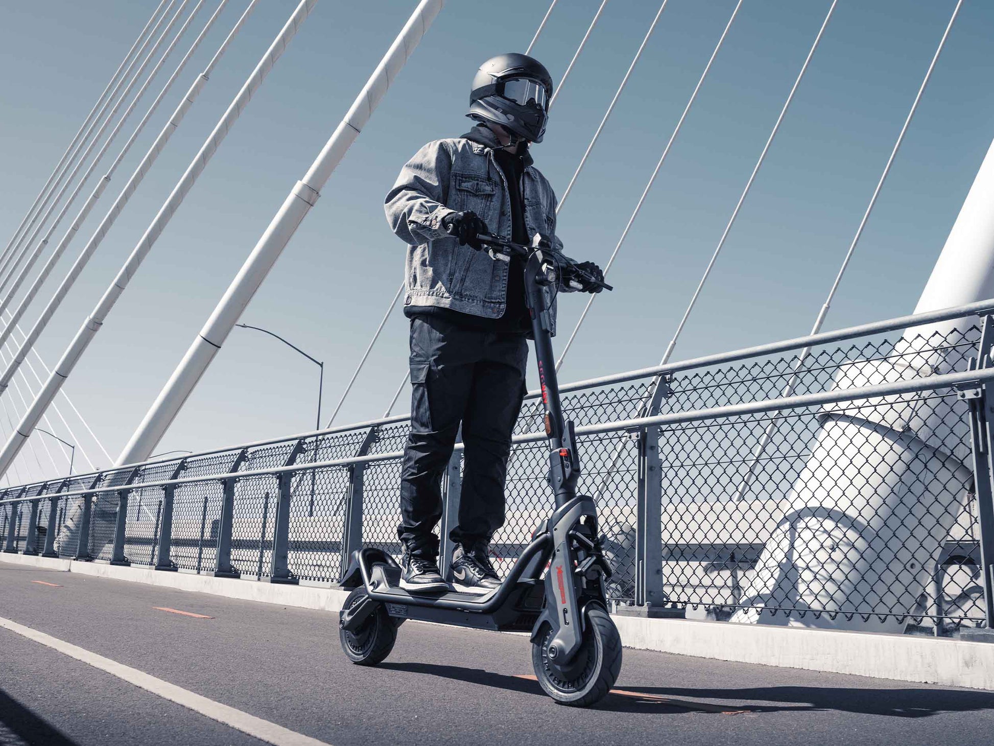 segway ninebot gt3 electric scooter lifestyle riding bridge